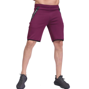 Short de jogging de sport avec poches zippées à taille élastique pour hommes